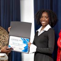 Woman receiving a certificate